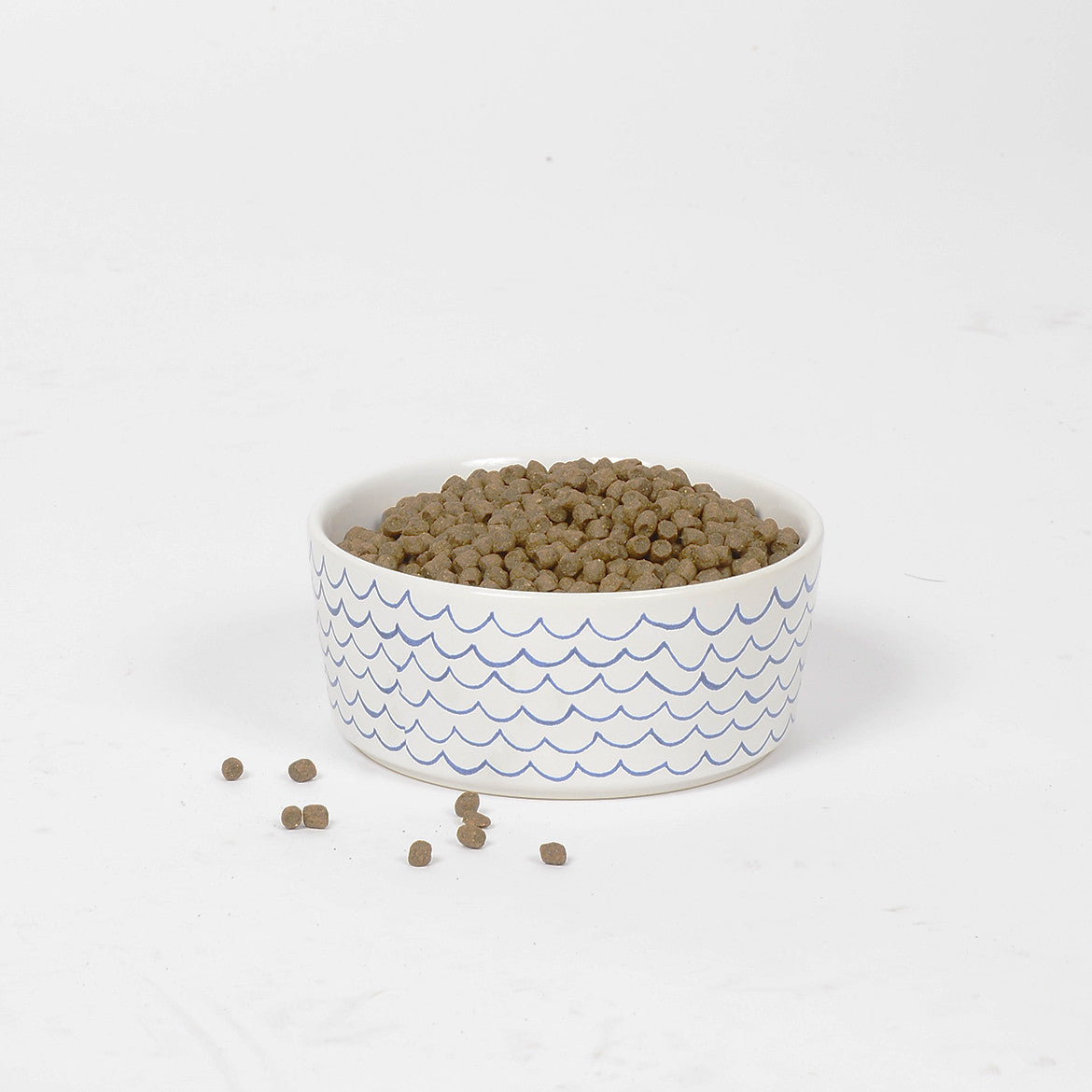 Sketched Wave Ceramic Dog Bowl by Waggo full of food