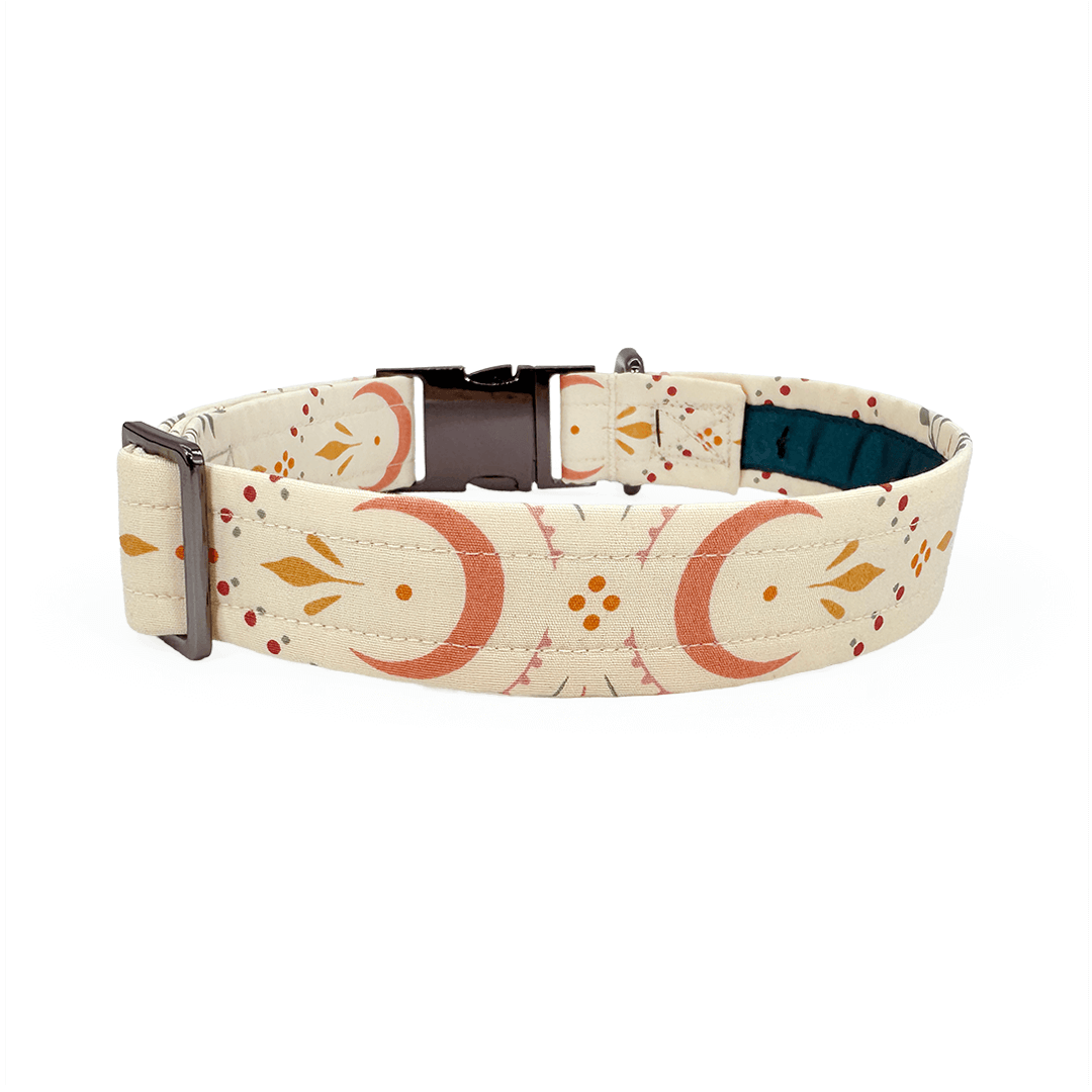 Natural dog collar with crescent moons and florals with black gun metal hardware-back view